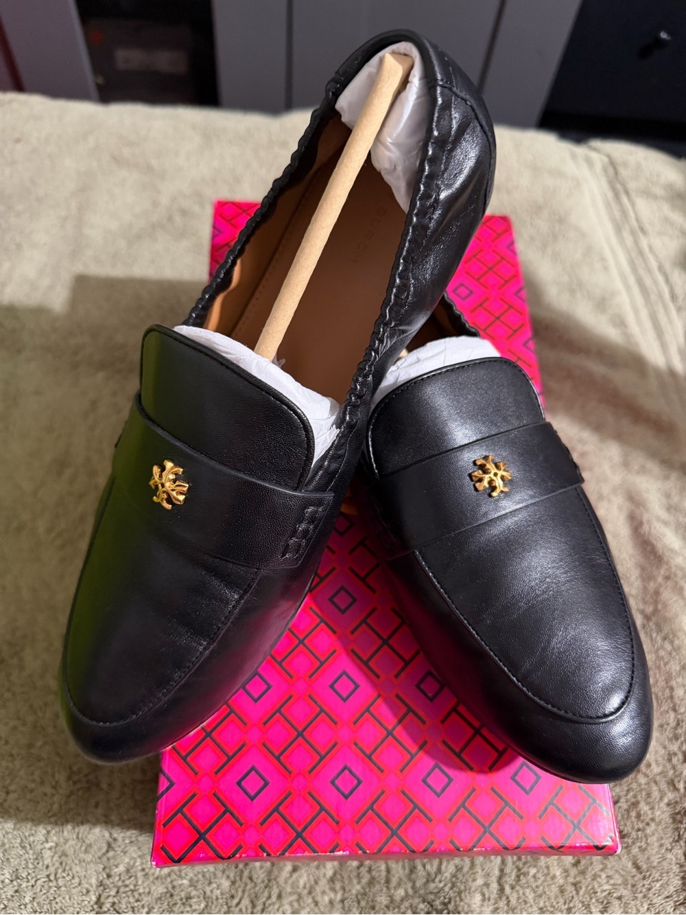 Tory Burch Black Leather Slip-On Loafers with Gold Emblem